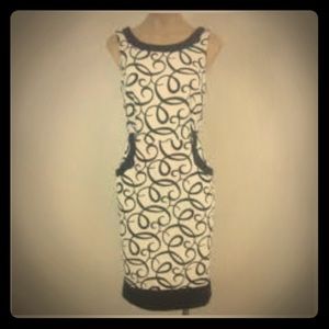 Ivory w/ black swirls & trim, functional pockets!